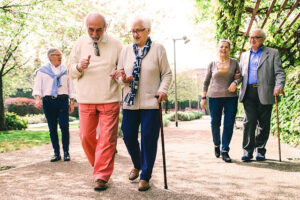 Group of old people walking outdoor